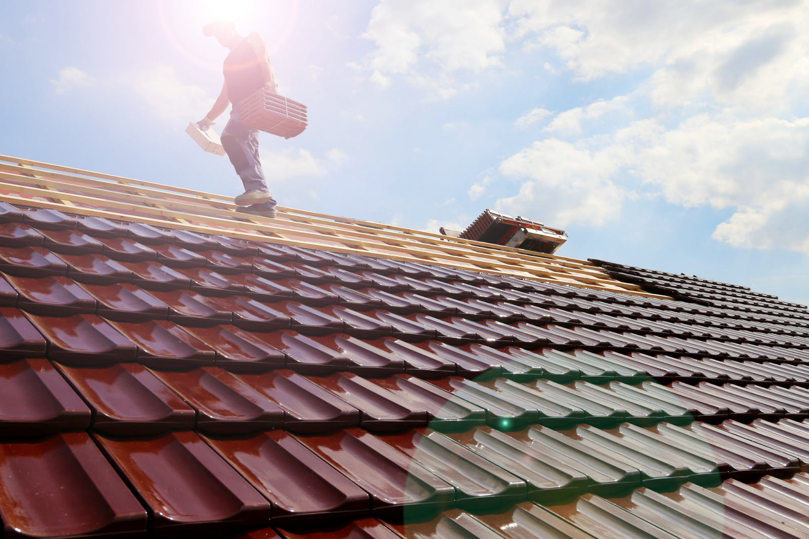 A contractor on a roof.